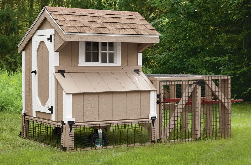 tan and white trimmed tractor chicken coops in Nevada